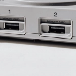 Игровые барабаны Gates of Olympus на фоне древнегреческого храма